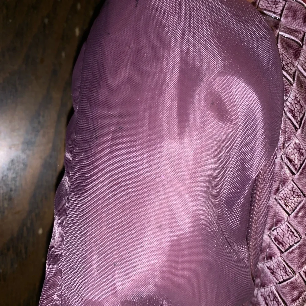 Estee Luader purple makeup bag